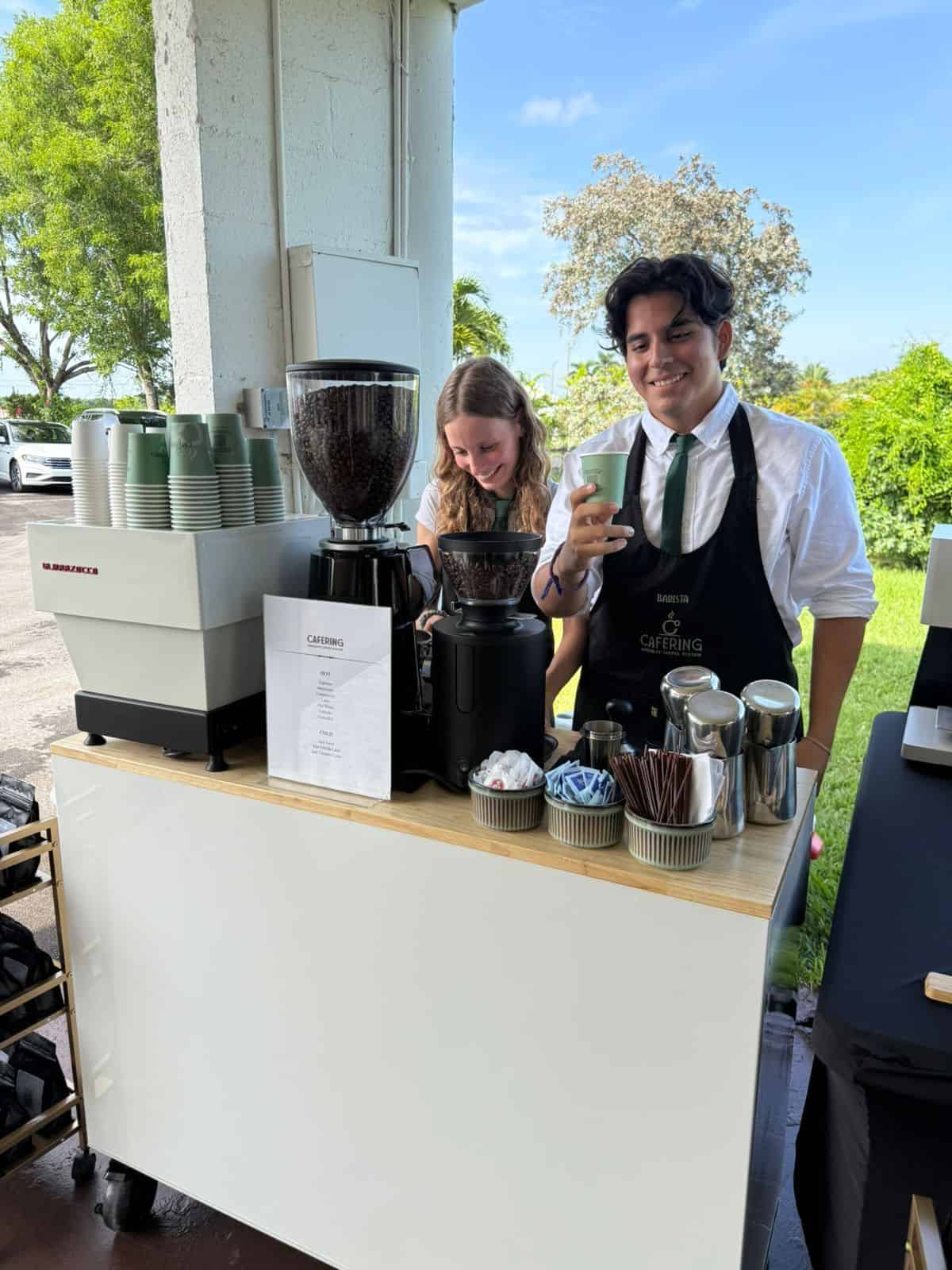 Coffee cart catering at a birthday party event with smiling baristas