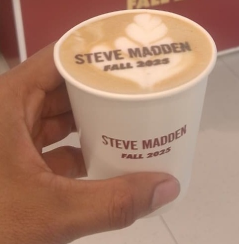 Logo printed directly onto coffee foam at a Miami event