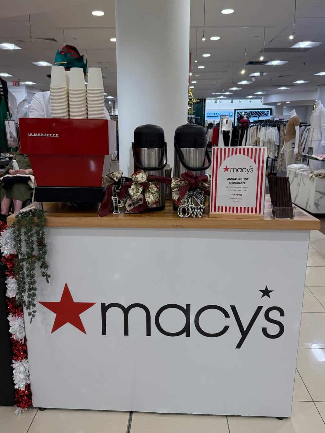 Macy's coffee and hot chocolate cart with a red La Marzocco for the holidays