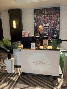 Barista serving guests at Miami Marathon Bayfront Park — Ryze Coffee activation