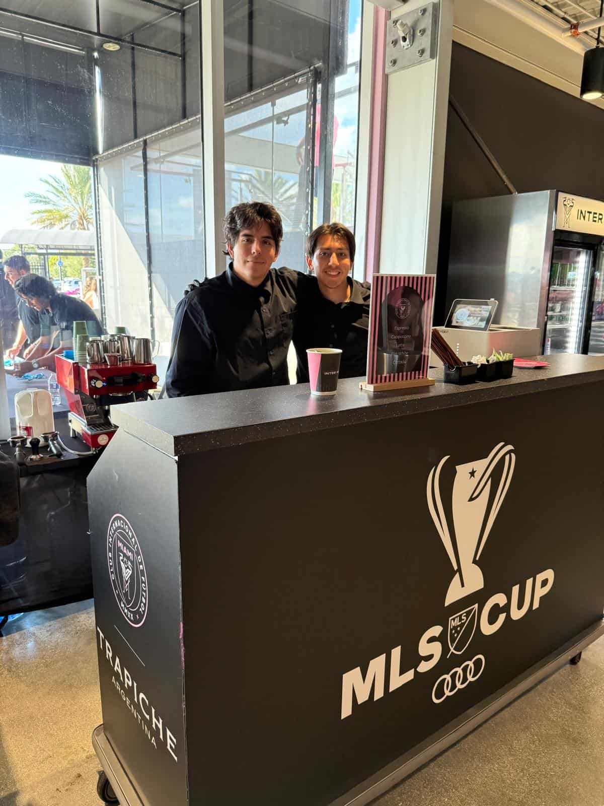 Custom black branded Cafering coffee bar staffed by two baristas inside Inter Miami's Northwest Club at Chase Stadium during the MLS Cup Final