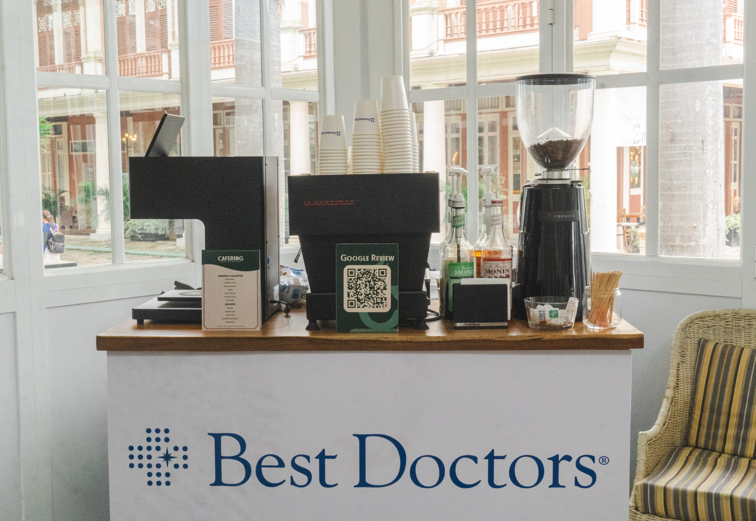 Baristas staffing a coffee bar during a conference session break