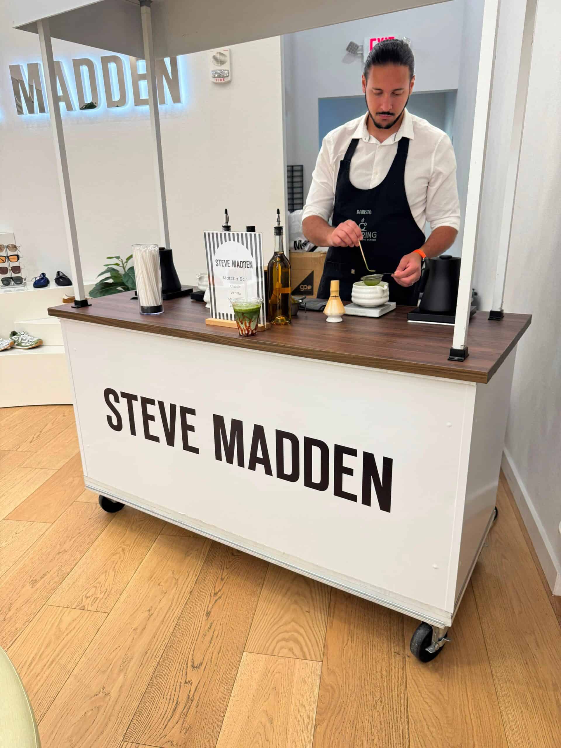 Branded coffee cart set up for an in-store matcha activation