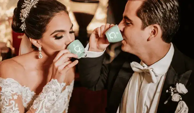 Newlyweds with a Cafering coffee cup